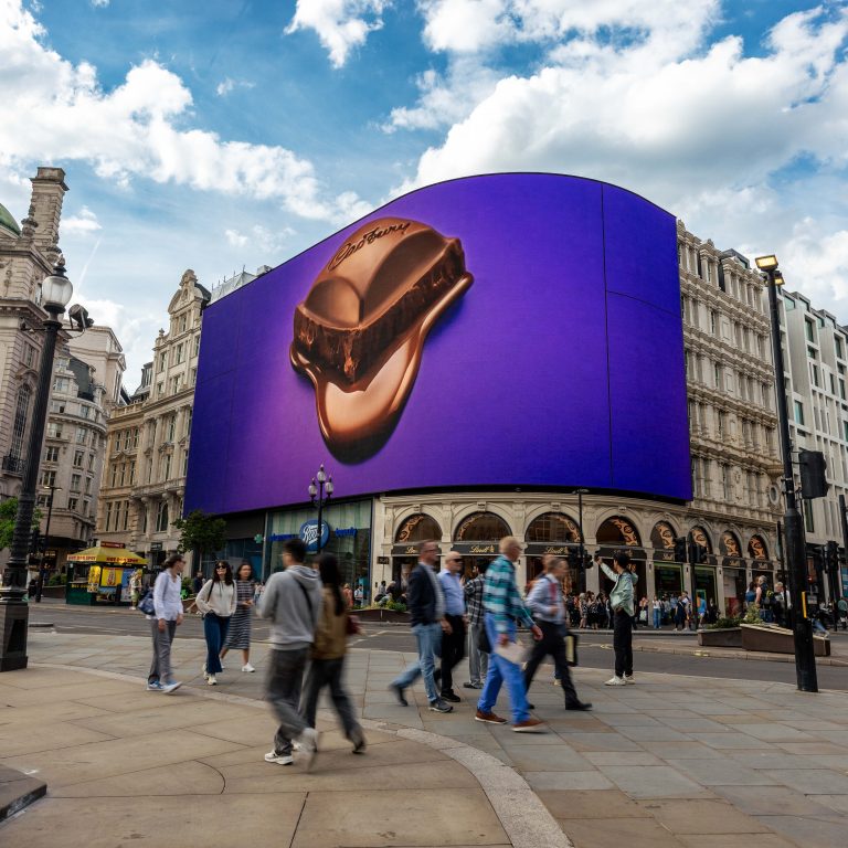 A melting piece of Cadbury Dairy Milk chocolate displayed on the Piccadilly Lights screen in London, as part of Cadbury's global campaign.