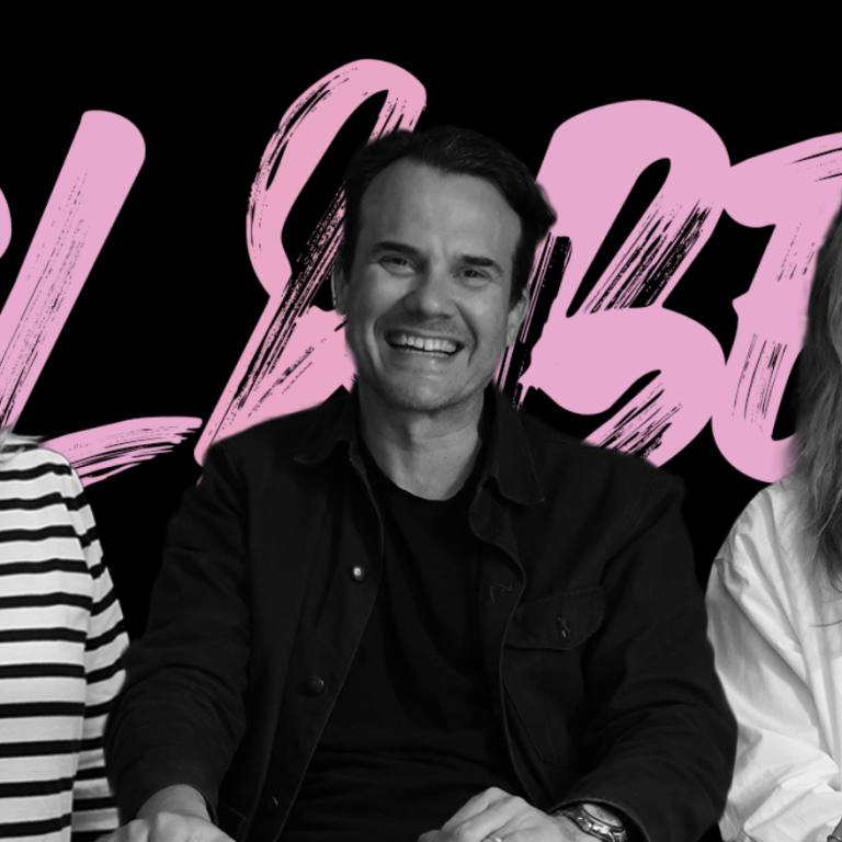 Brett Edgar, Robert Valdes, and Claire Young in front of the Girl&Bear logo